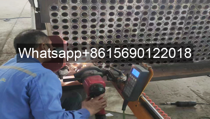 Shell-and-tube heat exchanger welding uses robotic arm welding