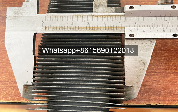 Hot-dip galvanized elliptical finned tubes Measurement of fin width