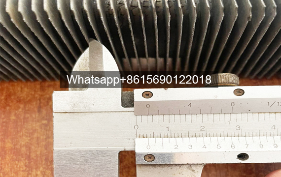 Thickness measurement of hot-dip galvanized elliptical and rectangular finned tubes